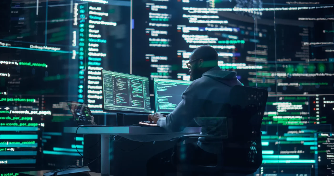 Cybersecurity in Baton Rouge. An image of a man performing cybersecurity defense work in an office.